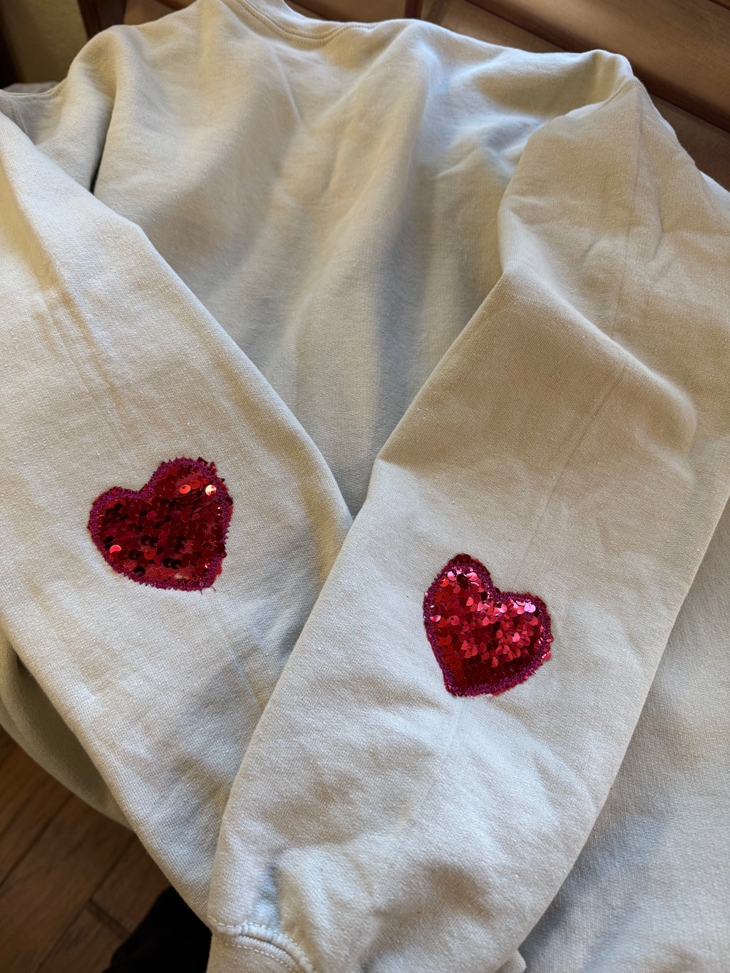 Red Sequin Heart on sleeve