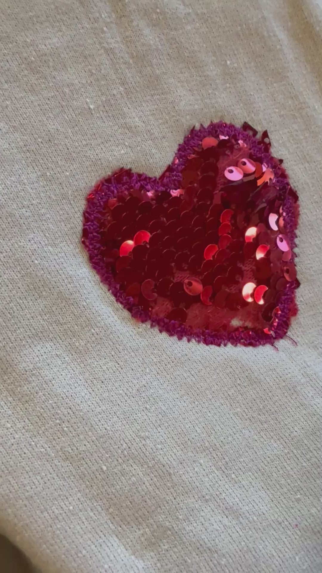 Red Sequin Heart on sleeve