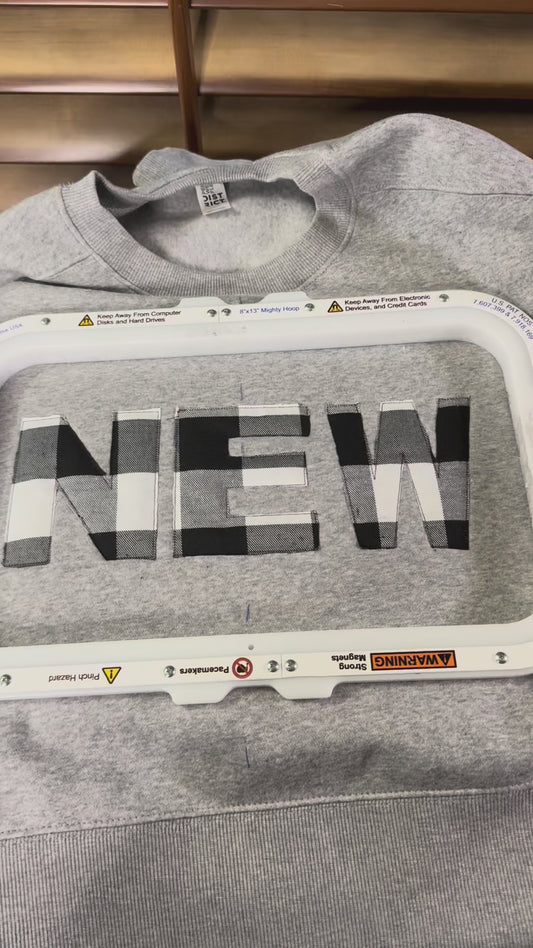 Buffalo plaid New Year sweatshirt